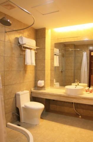 Zhou Wang Cheng Hotel Лоян Номер фото
